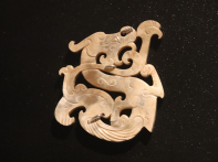 Warring_States-Han_Jade_Dragon_29 - Jade-carved dragon ornament from the Warring States period 403221 BC.jpg